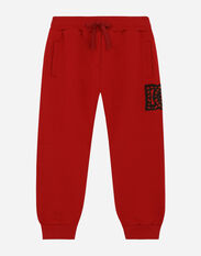 Dolce & Gabbana Jersey jogging pants with logo patch Red L5JP9GG7E3Z