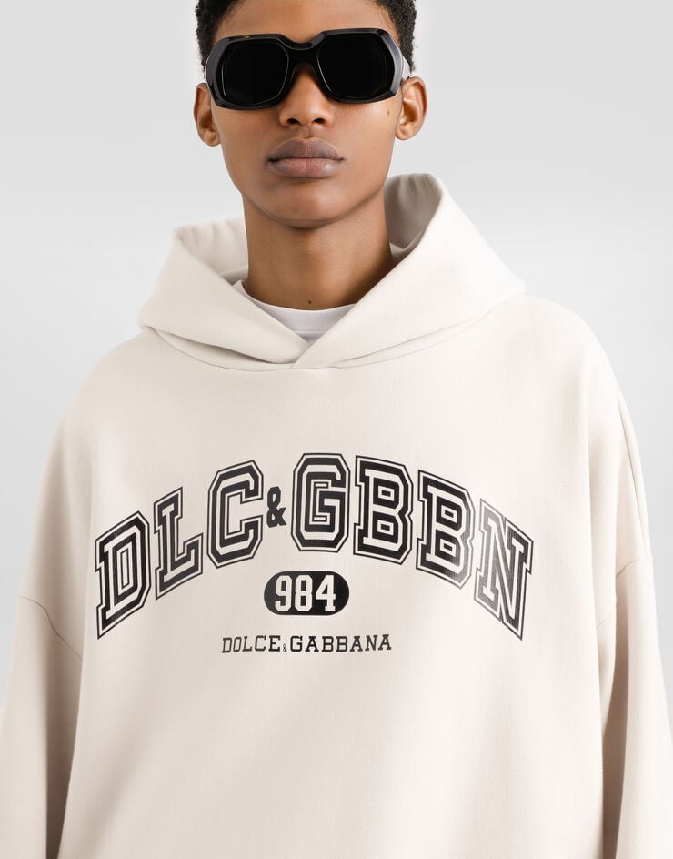 Dolce & Gabbana Kapuzensweatshirt aus Jersey mit Print Beige G9BJGTG7PLO
