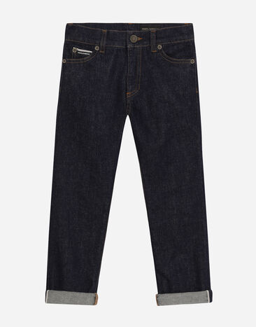 Dolce & Gabbana Jeans 5 tasche in denim stretch con placca logo Stampa L43Q47FI5JO