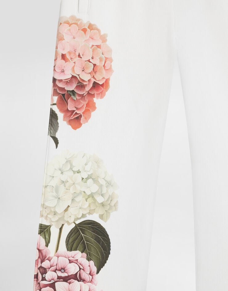 Dolce & Gabbana Hydrangea-print jersey trousers with patch White L5JPIOG7PSD