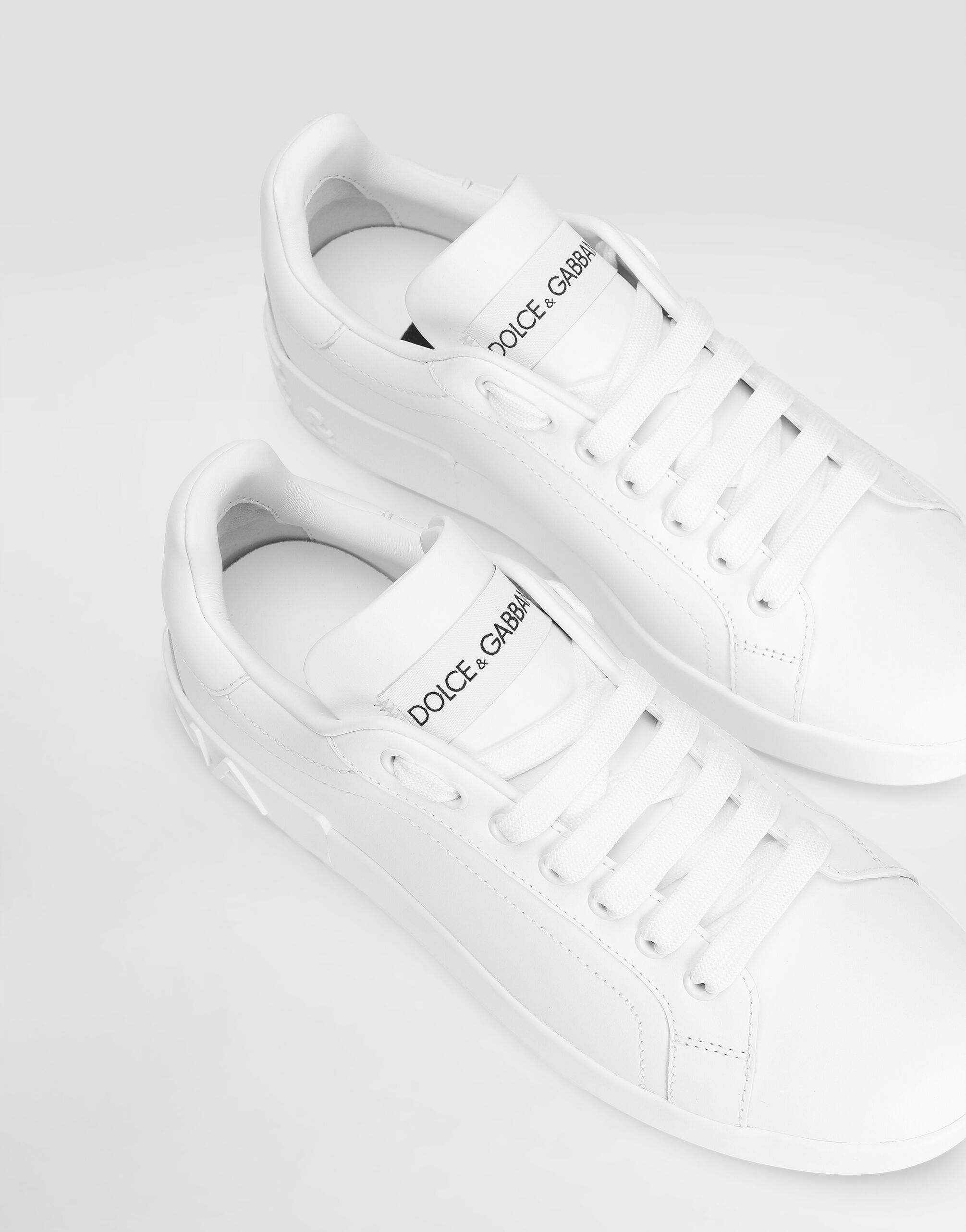 Calfskin Portofino sneakers in White for Women