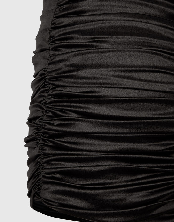 Dolce&Gabbana Falda drapeada corta de raso con detalle anudado en lateral Negro F4CRCTFURAG