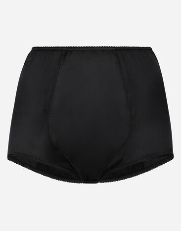 Dolce & Gabbana Das sinnliche Sicilia-Schwarz veredelt die stylishe Taillenpanty von Dolce&Gabbana. Sie können sie sowohl als Unterwäsche als auch zu transparenten Kleidern tragen; um Ihren Looks einen glamourösen Touch zu verleihen. SCHWARZ O2A18TONO13
