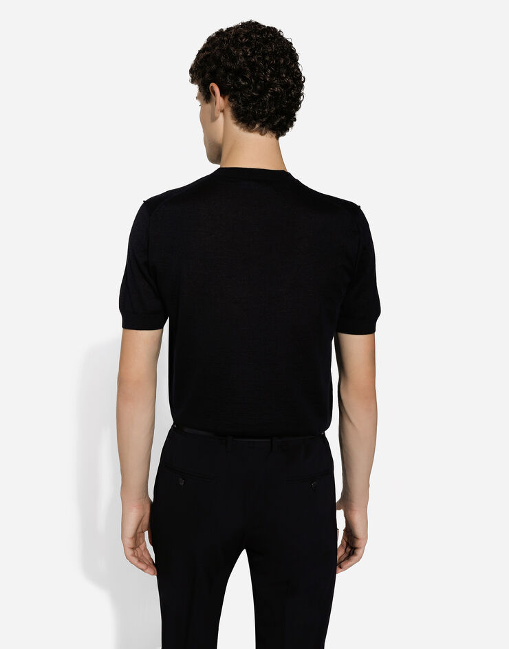 Dolce & Gabbana Jersey de cuello redondo de cachemira con DG bordado Negro GXX59ZJAWXR