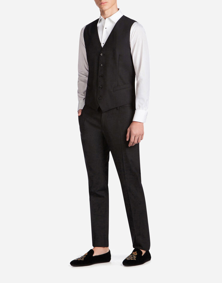 Dolce & Gabbana Five button vest in wool Black G7505TFUBBG