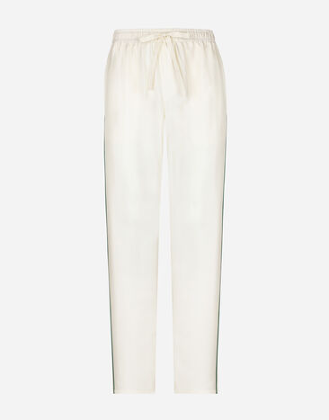 Dolce & Gabbana Спортивные брюки из шелка с вышивкой DG Отпечатки GVRMATHI1SV