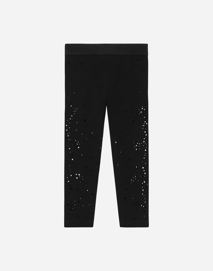 Dolce & Gabbana Leggings aus Interlock mit Thermostrass Mehrfarbig L5JP3JG7JK9