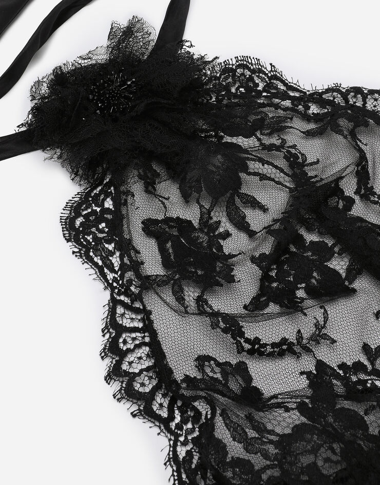 Dolce & Gabbana Top asimétrico de encaje con detalle de flor en el cuello Negro F79EPTHLM44