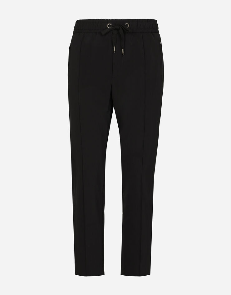 Dolce & Gabbana Pantalón de chándal de tejido técnico elástico Negro GYACETFURLI