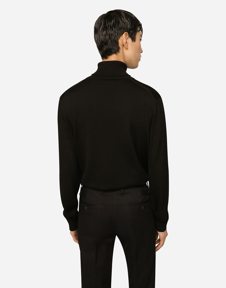 Dolce&Gabbana Wool turtle-neck sweater with branded tag Black GXO35TJCVC7