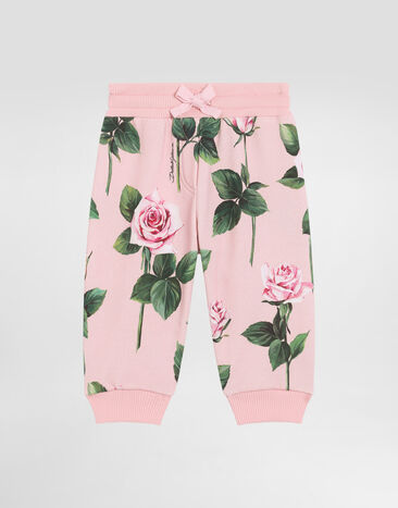 Dolce & Gabbana Cotton fleece jogging pants with rose print Print L23Q34FI5KS
