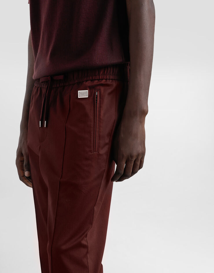 Dolce & Gabbana Jogginghose aus Baumwolle mit Plakette Mehrfarbig GYACETFUFNV