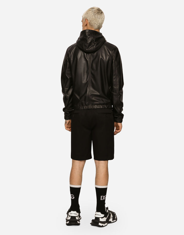 Dolce & Gabbana Blouson en cuir avec capuche et plaquette à logo Noir G9ZY6LHULR0