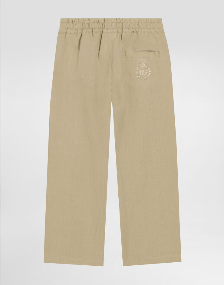 Dolce & Gabbana Pantaloni in lino con logo DG ricamato Beige L44P86G7O9A