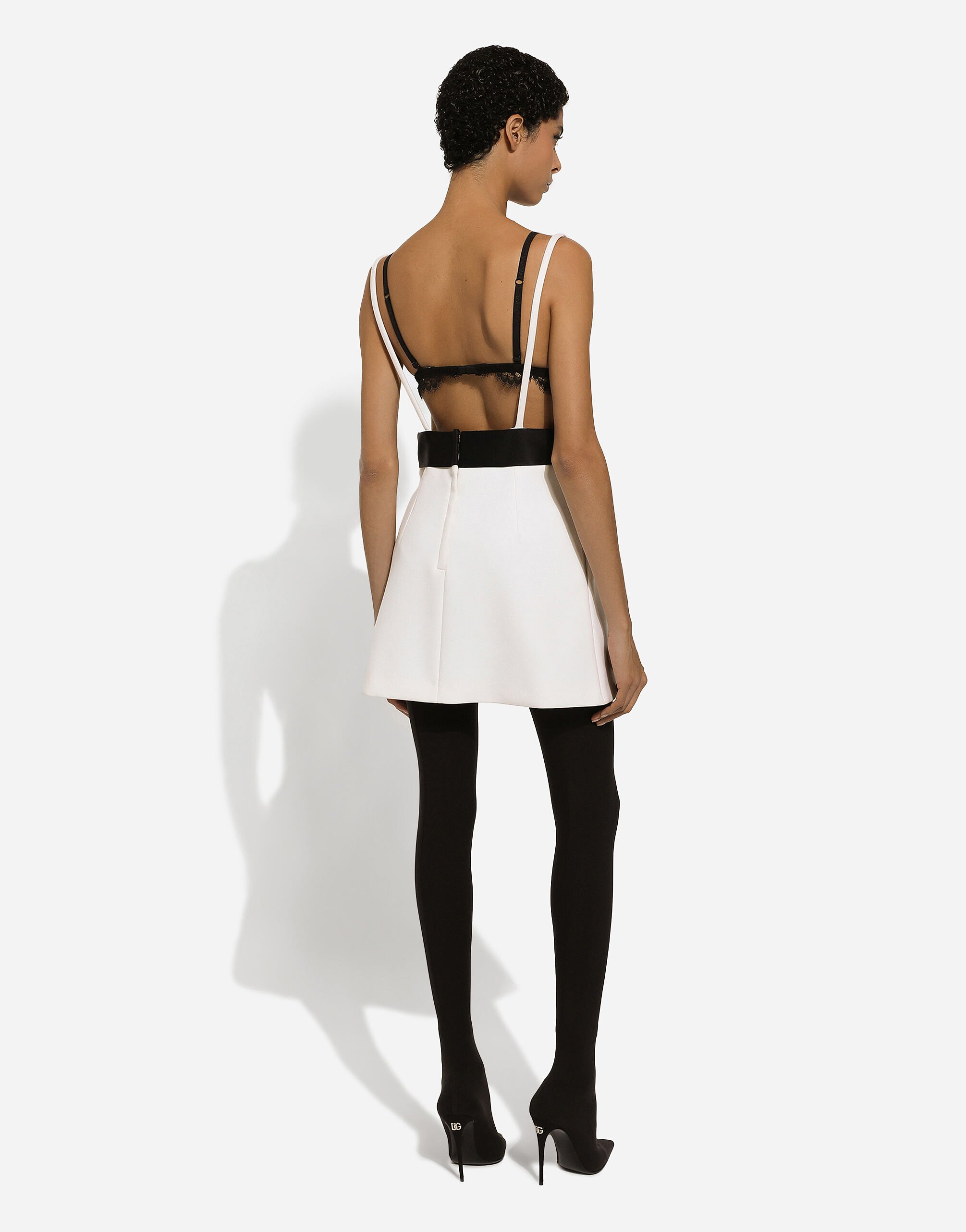 Short woolen dress with satin belt and straps in White for