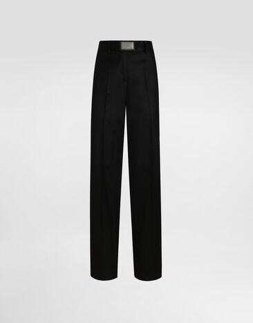 Dolce&Gabbana Pantalon flare en flanelle avec plaquette à logo Noir FTCZITGDBWV