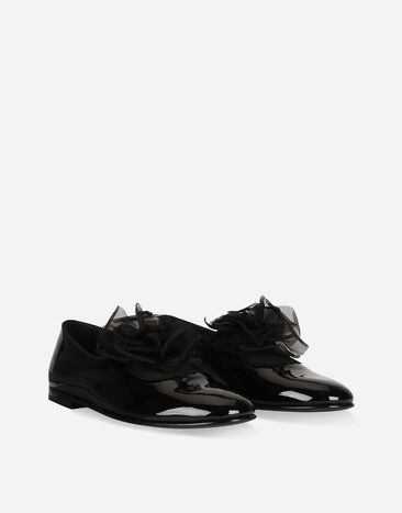 Dolce & Gabbana Slippers en cuir verni avec fleur appliquée Noir A50645A3G48