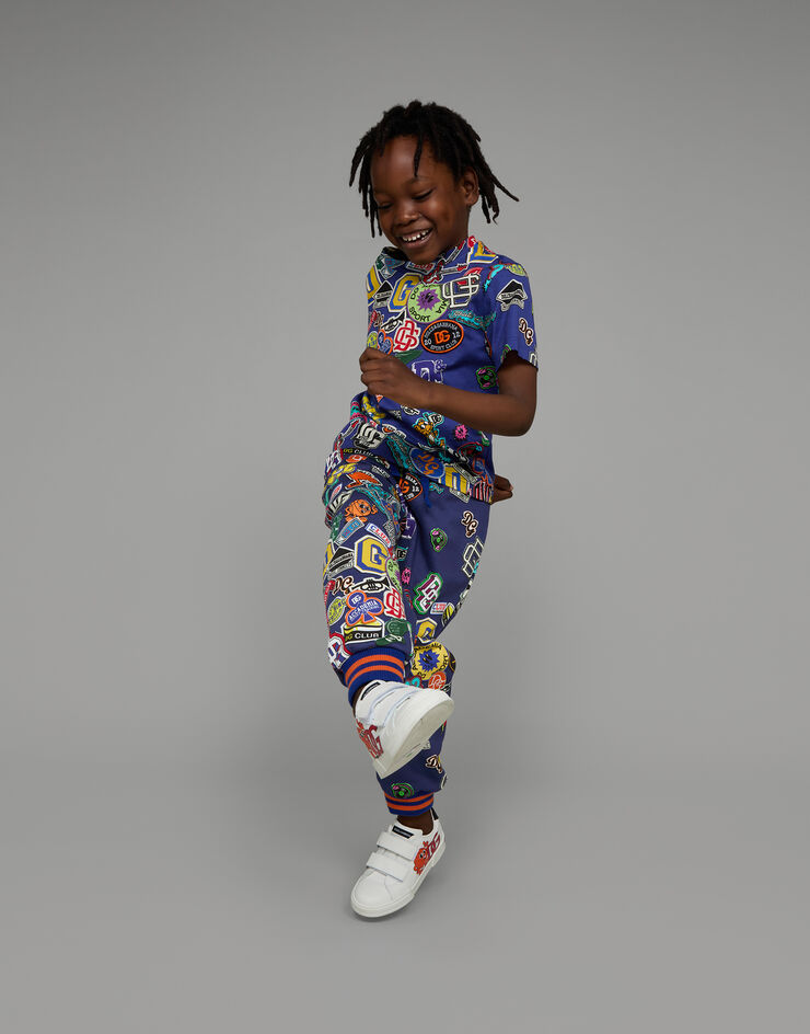 DolceGabbanaSpa Cotton jogging pants with stickers print Blue L4JPGMHS7L9