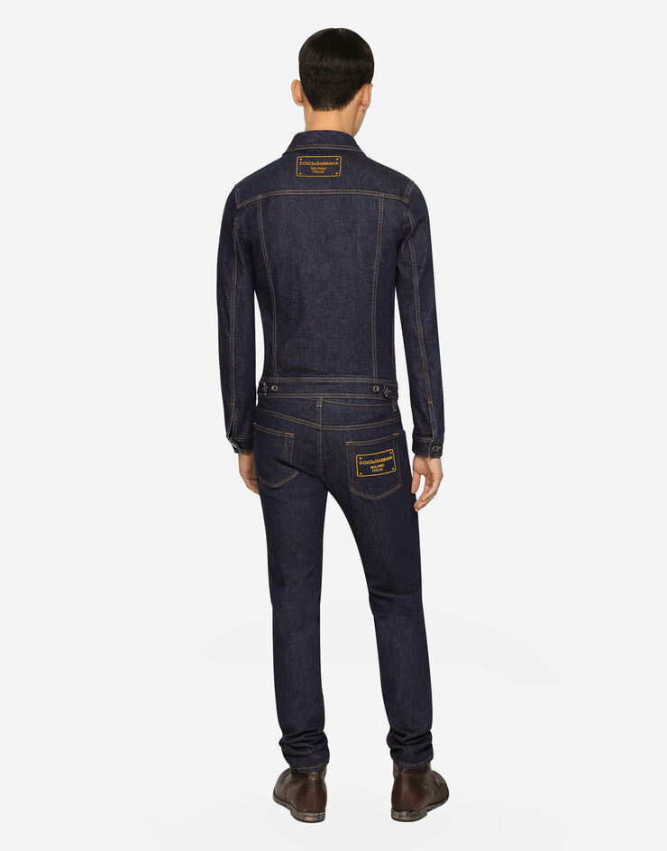 Dolce&Gabbana Skinny stretch denim jeans with flocked logo tag Multicolor GY07LDG8JJ2