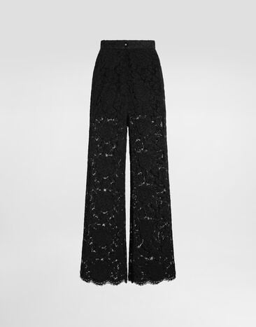 Dolce & Gabbana Pantalon flare en dentelle stretch à logo Noir FTCPTTFLRE1