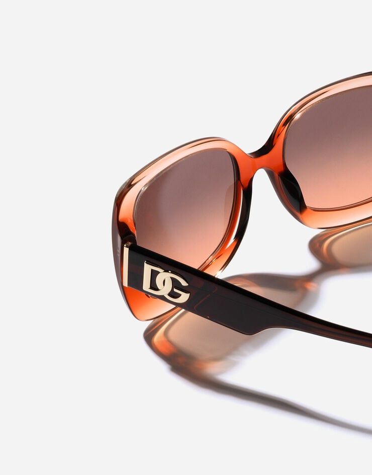 Dolce & Gabbana Lunettes de soleil à motif Maiolica Arancione Dolce & Gabbana Lunettes de soleil à motif Maiolica Arancione Transparent gradient orange VG4513VP078