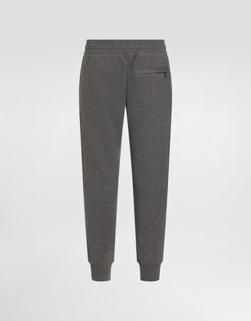 Dolce & Gabbana Jersey trousers with heraldic patch Grey GP07TZG7PZT