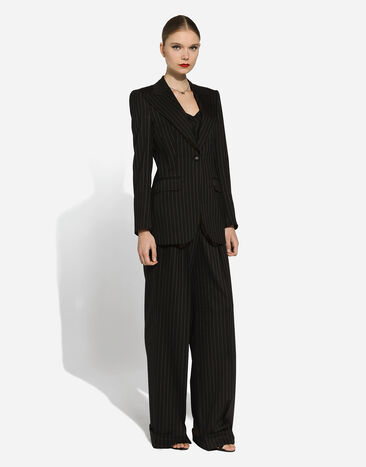 Dolce & Gabbana Pantalon flare en laine à rayures tennis Multicolore FTBMPTFRBDB