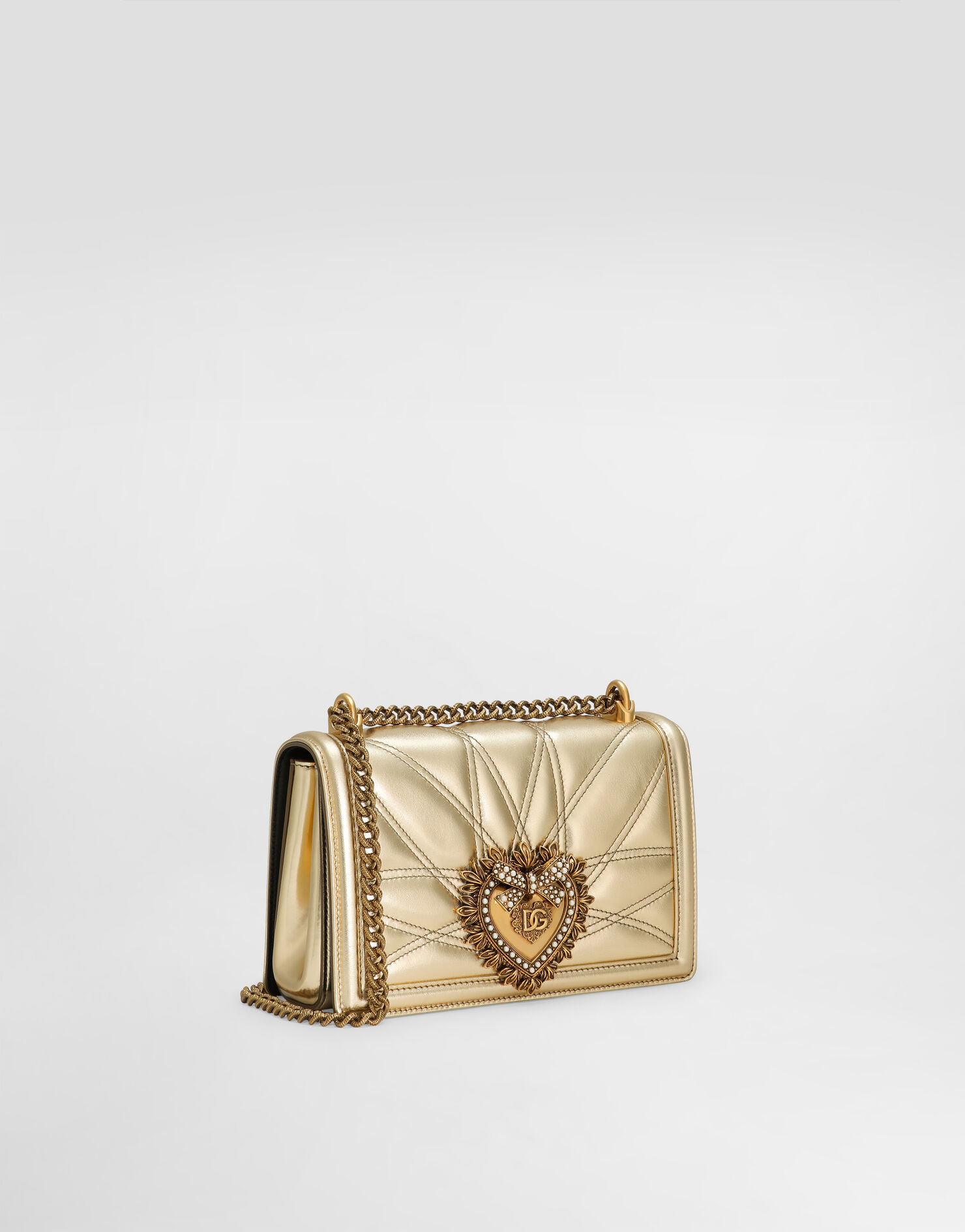 Side view of the medium Dolce & Gabbana Devotion Bag showing its slim profile.