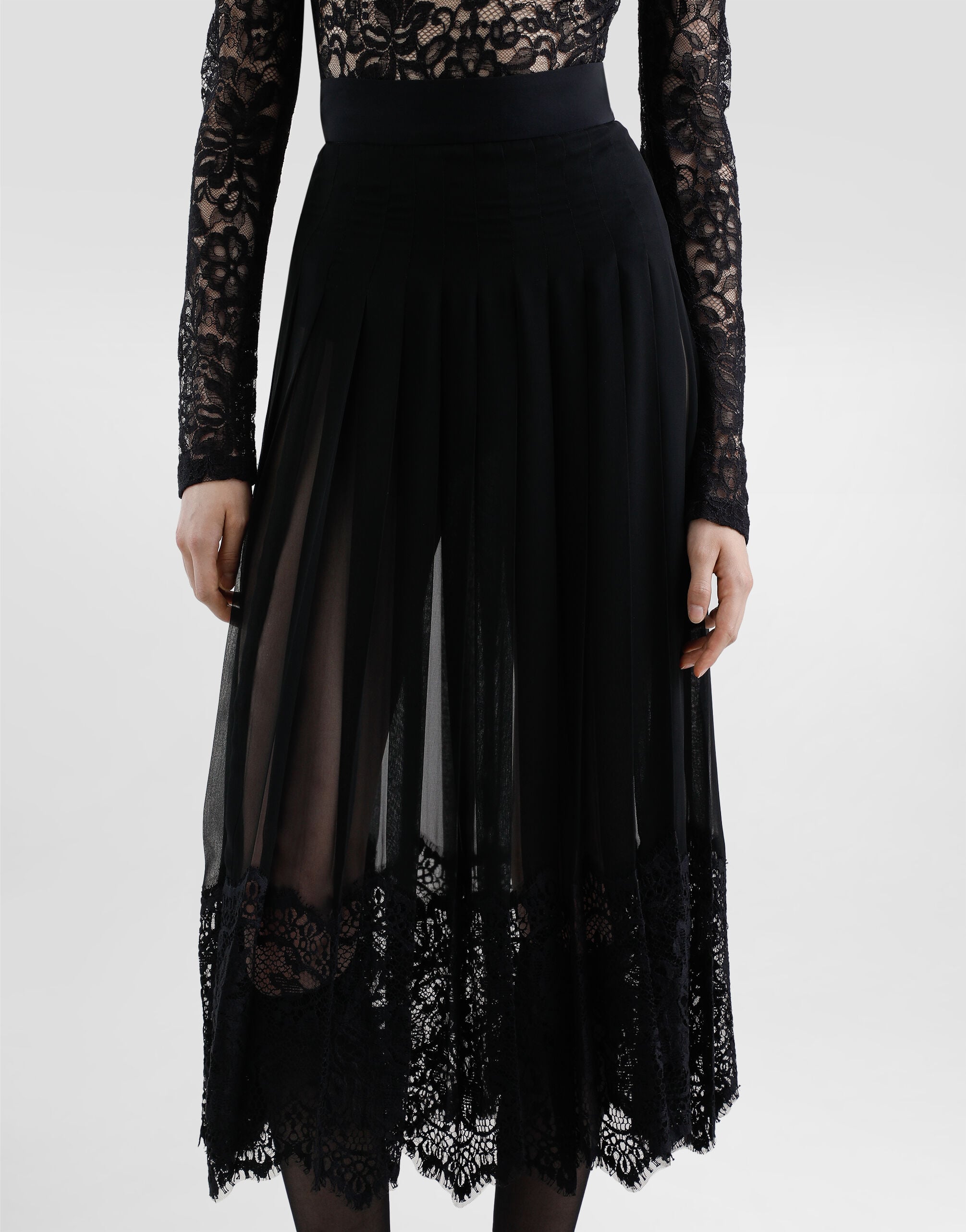 Calf-length circle skirt in pleated georgette with lace trims in