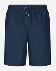 Dolce & Gabbana Mid-length swim trunks with logo tag Blue M4A72JONN67
