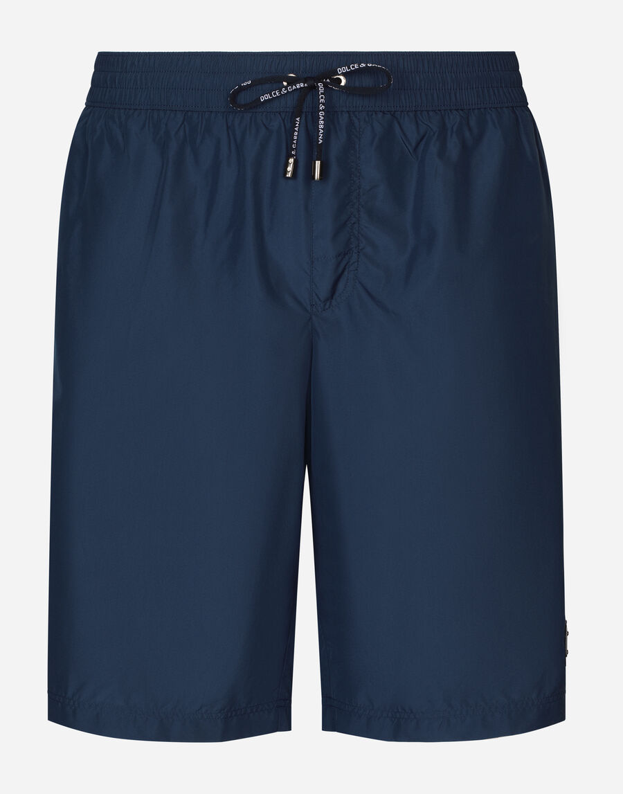 Mid-length swim trunks with logo tag