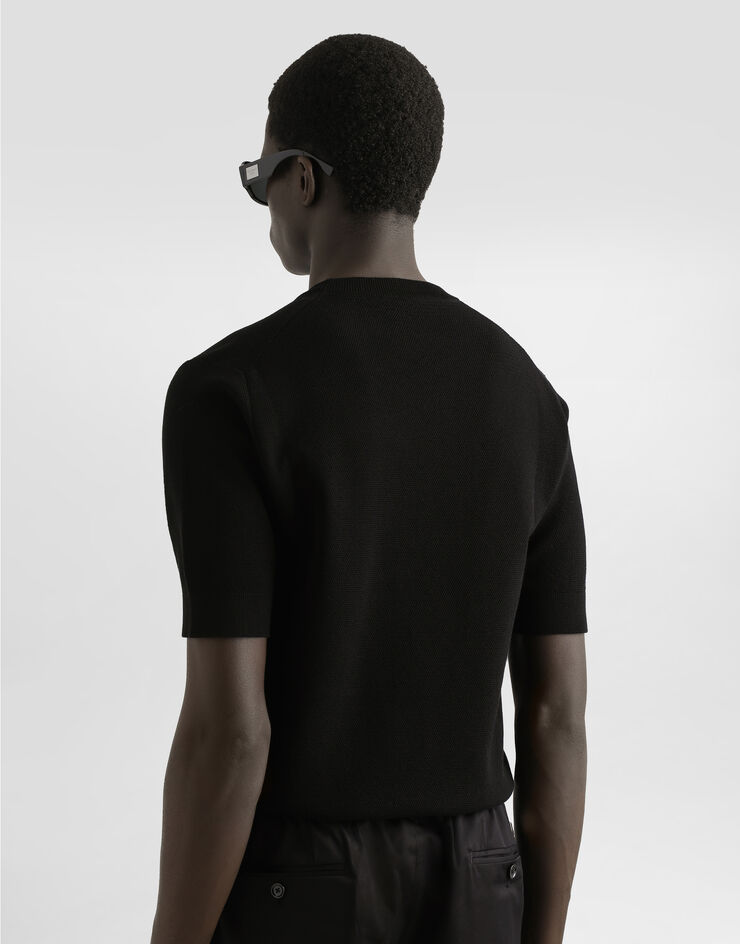 Dolce & Gabbana Pull ras de cou en coton avec plaquette Noir GXX03TJBCF5
