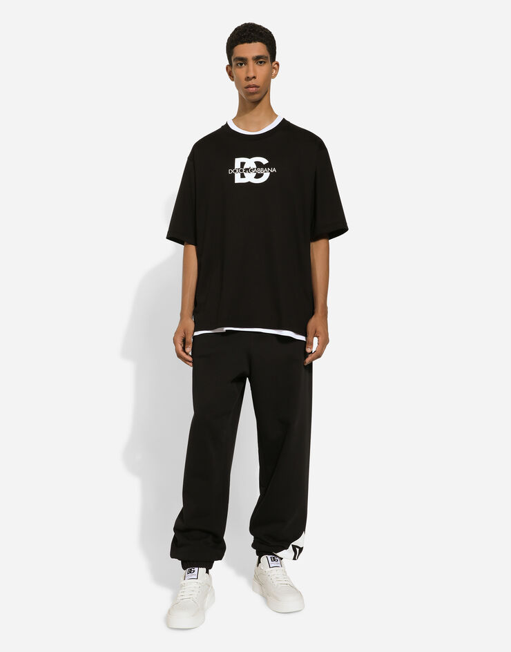 Dolce & Gabbana Cotton jogging pants with logo Black GP03BTG7L3R