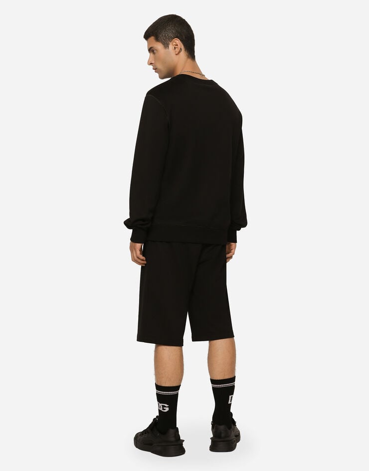 Dolce & Gabbana Jersey jogging shorts with logo tag Black GVB7HTG7F2G