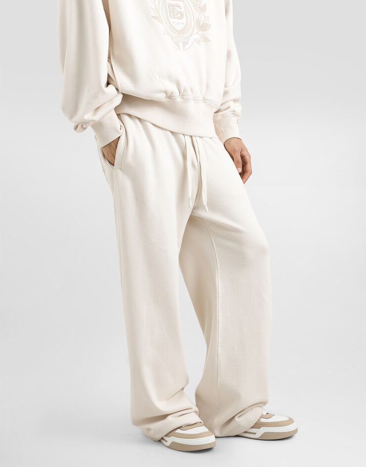 Dolce & Gabbana Stretch jersey jogging pants with embroidery Cream GVZ7AZG7O2J