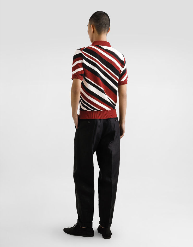 Dolce & Gabbana Jersey polo de algodón de manga corta con intarsia a rayas Multicolor GXZ64TJFMMS
