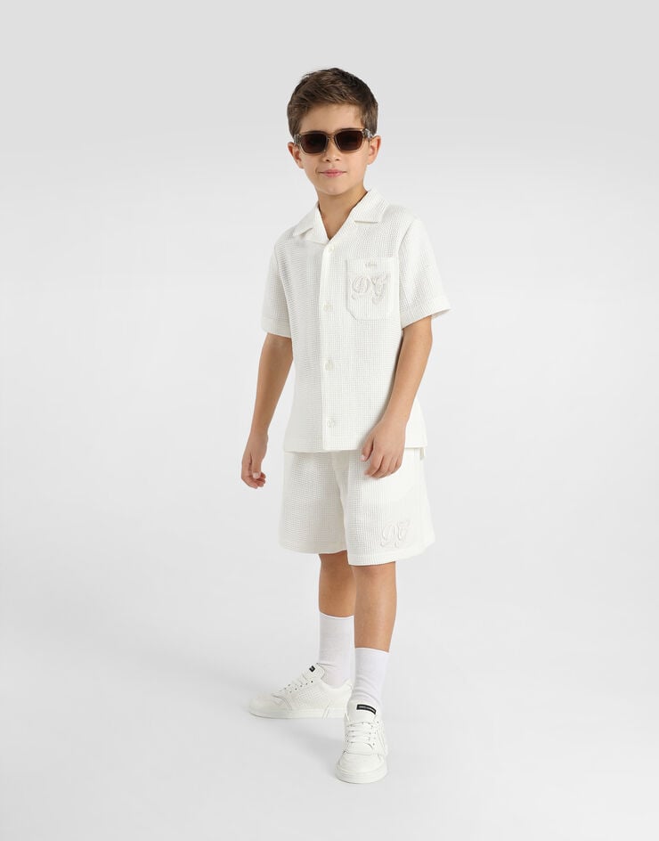 Dolce & Gabbana Cotton waffle bermuda shorts Dolce & Gabbana Cotton waffle bermuda shorts White L43Q97FU628