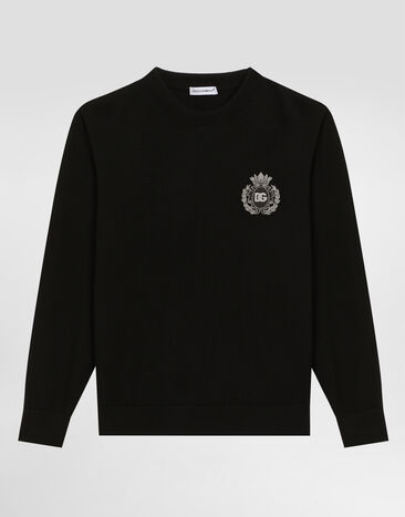 Dolce & Gabbana Pullover aus glattem Strick mit Patch Schwarz L4KW22JCVXQ
