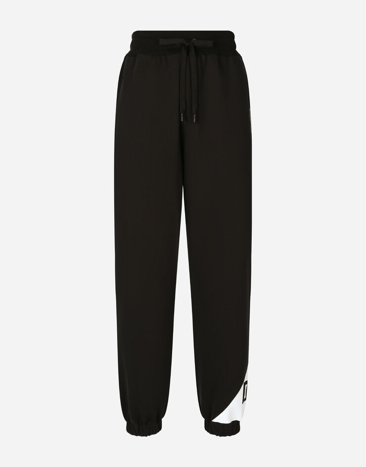 Dolce & Gabbana Pantalón de chándal de algodón con logotipo Negro GP03BTG7L3R