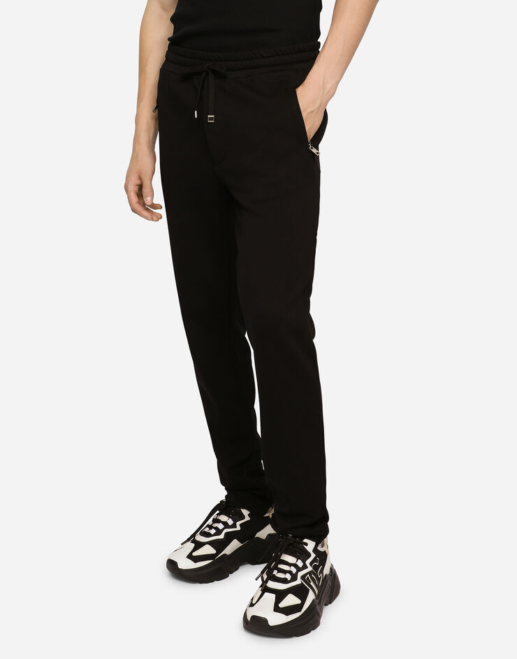 Dolce & Gabbana Pantalon de jogging en coton Noir G4ZCATG7JYX