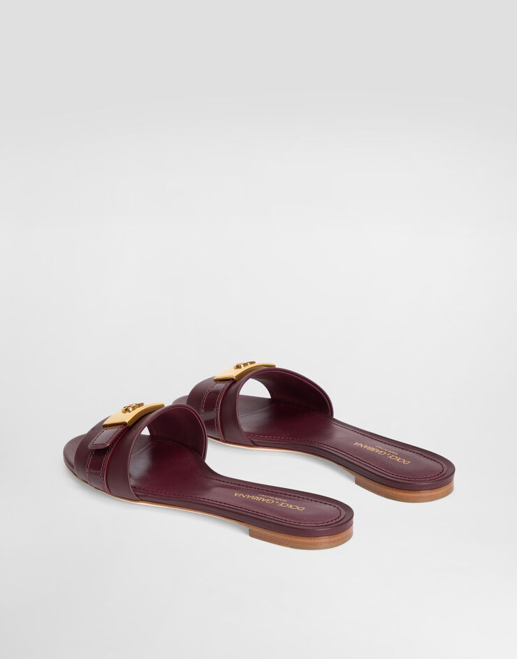Dolce & Gabbana Flat slides in calfskin Dolce & Gabbana Flat slides in calfskin Bordeaux CQ0731A3S70