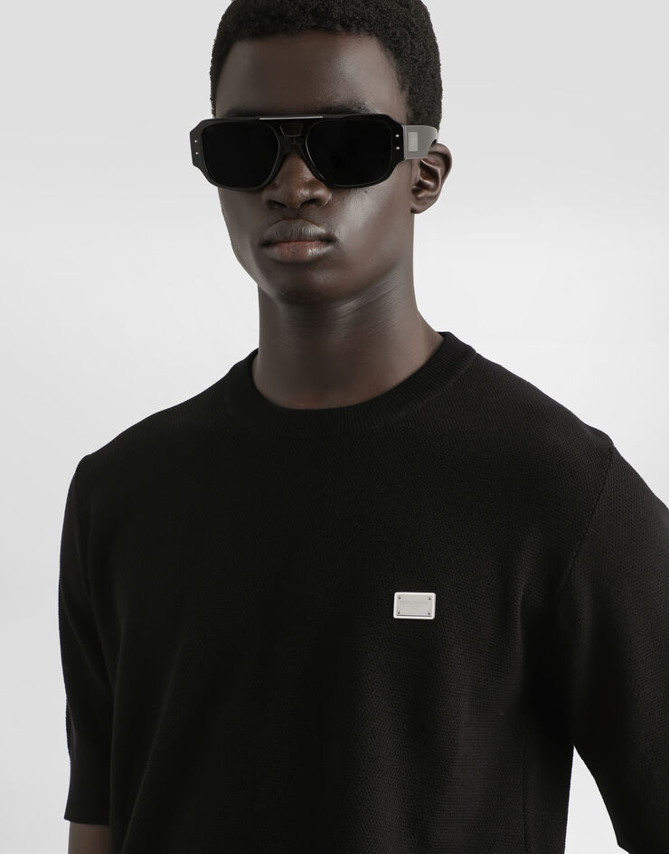 Dolce & Gabbana Pull ras de cou en coton avec plaquette Noir GXX03TJBCF5