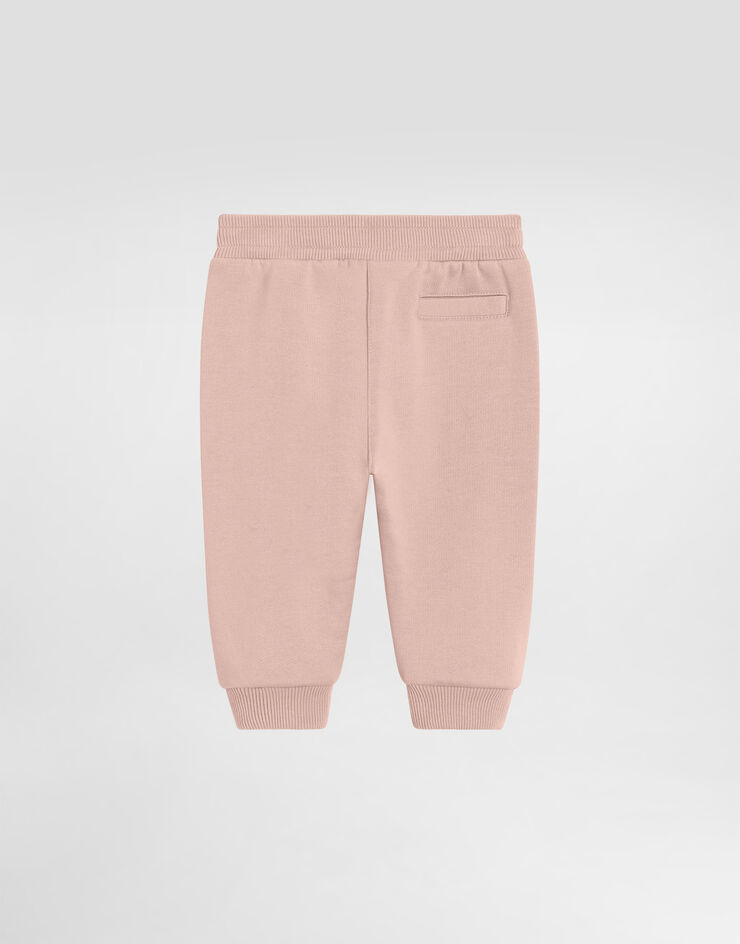 Dolce & Gabbana Fleece trousers with leopard heart patch Pink L2JPI1G7PSG