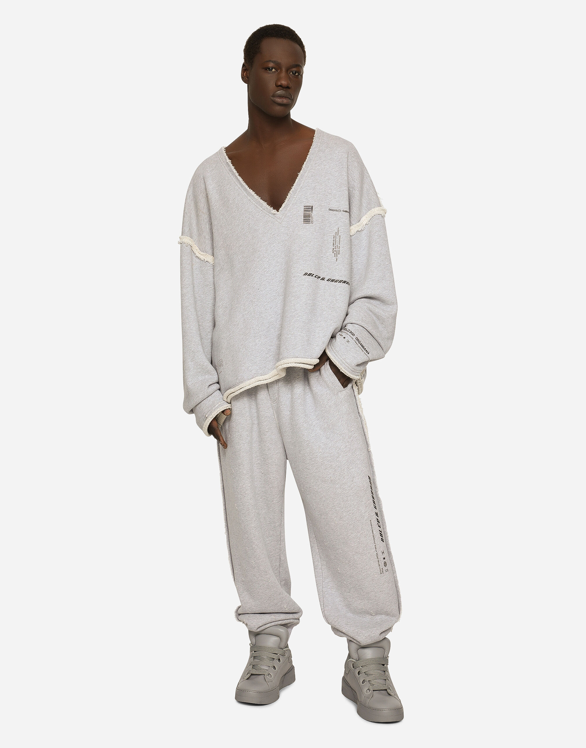 Printed jogging pants with small abrasions in Grey for for Men