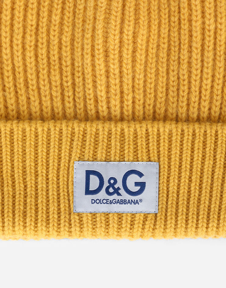 Dolce & Gabbana Bonnet en maille de cachemire à écusson DG Jaune GXE83TJBVB6