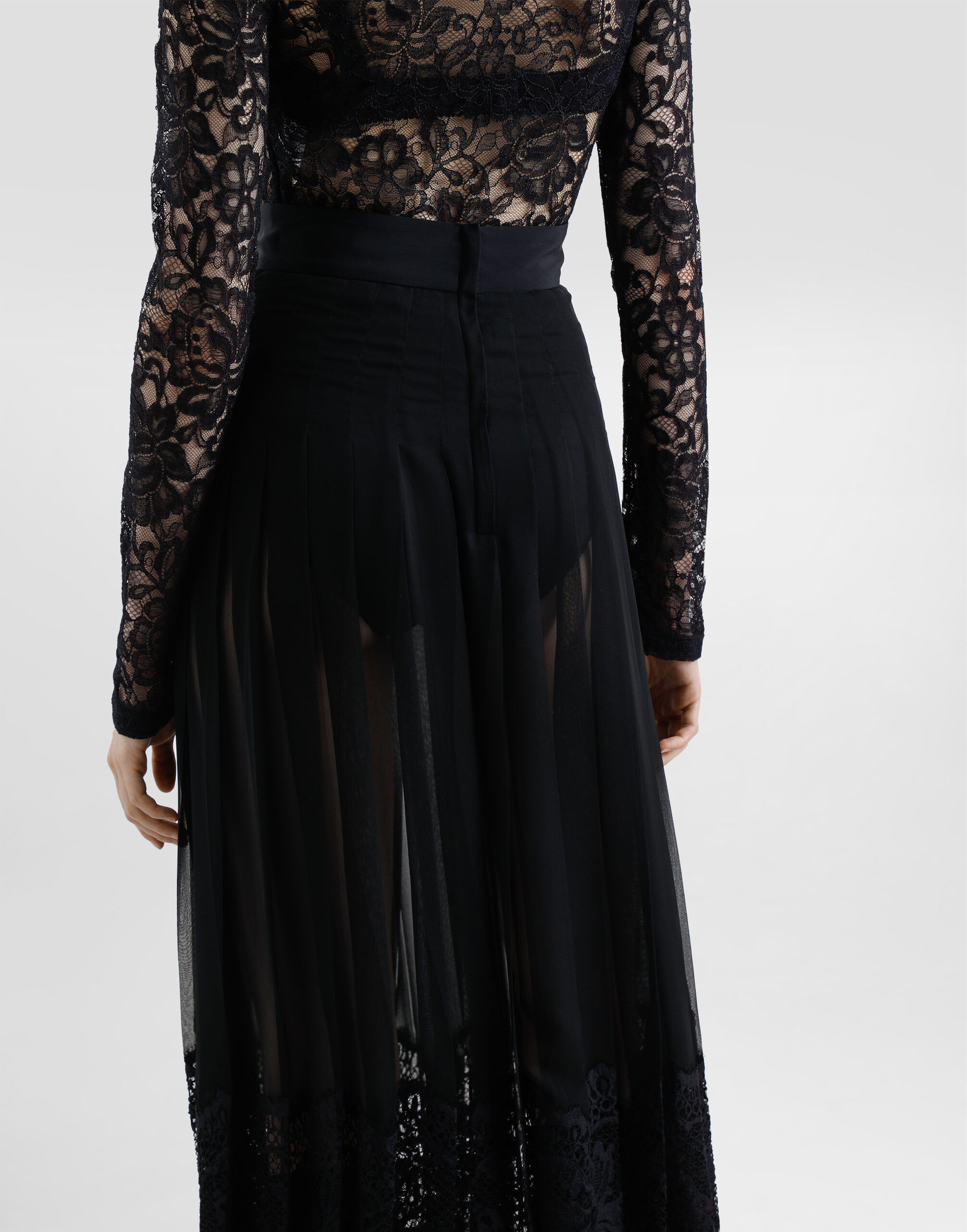 Calf-length circle skirt in pleated georgette with lace trims in