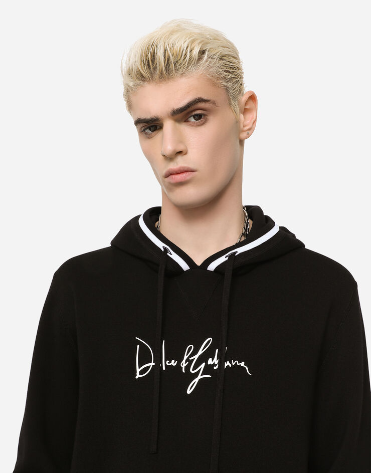 Dolce & Gabbana Wollpullover mit Kapuze und Stickerei Mehrfarbig GXE02TJBMJ0