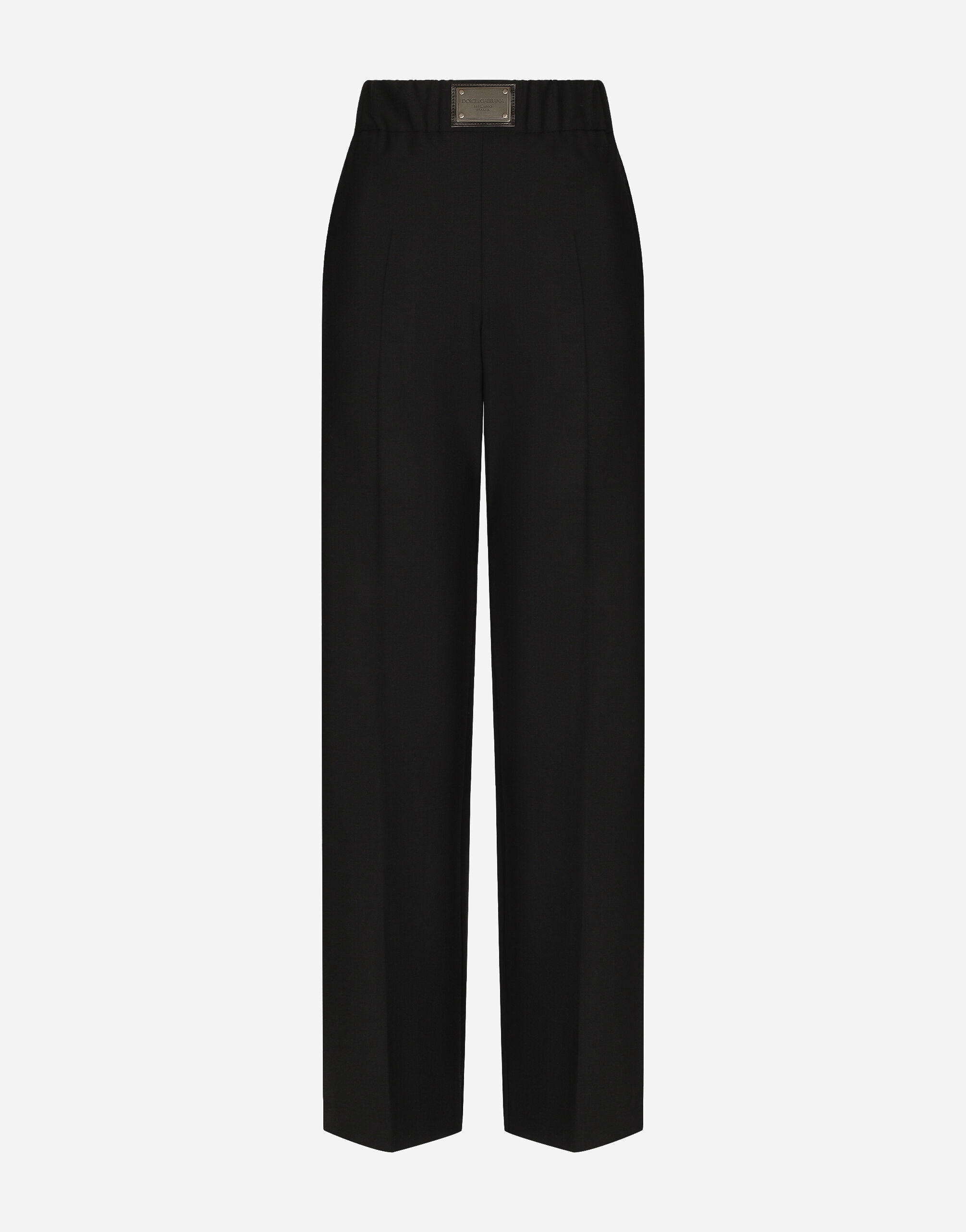 Dolce & Gabbana Flared wool pants with logo tag Black FTBMPTFU21E
