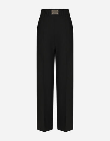 Dolce&Gabbana Pantalón acampanado de lana con placa con logotipo Negro FTCZJTGDBWS