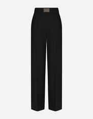 Dolce & Gabbana Flared wool pants with logo tag Print FTC3HTHS5Q0